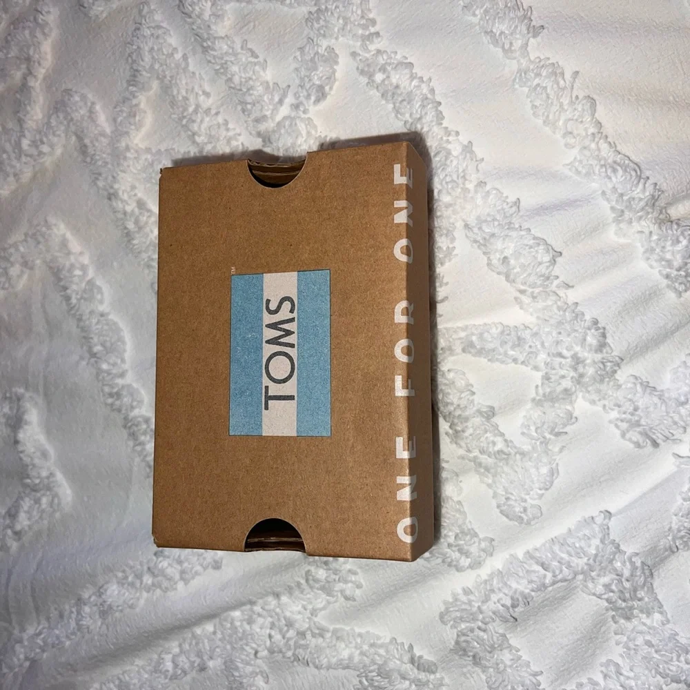TOMS Tiny Moccasins in Shimmering Silver